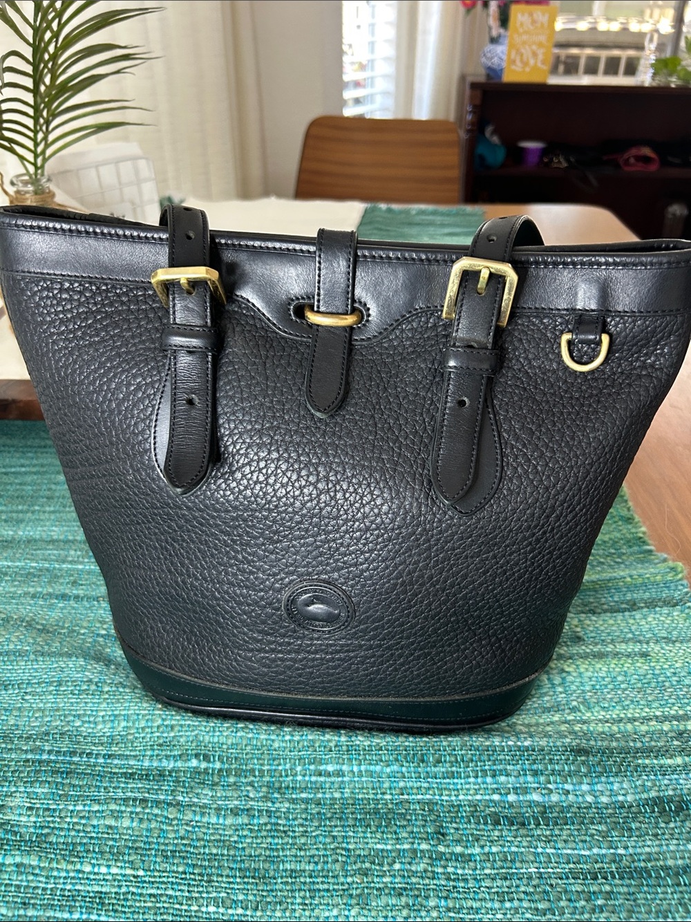 Dooney & Bourke Black Pebbled Leather Bucket Tote with Brass Hardware